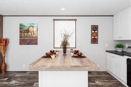 The THE SOCIAL 76 Kitchen. This Manufactured Mobile Home features 3 bedrooms and 2 baths.