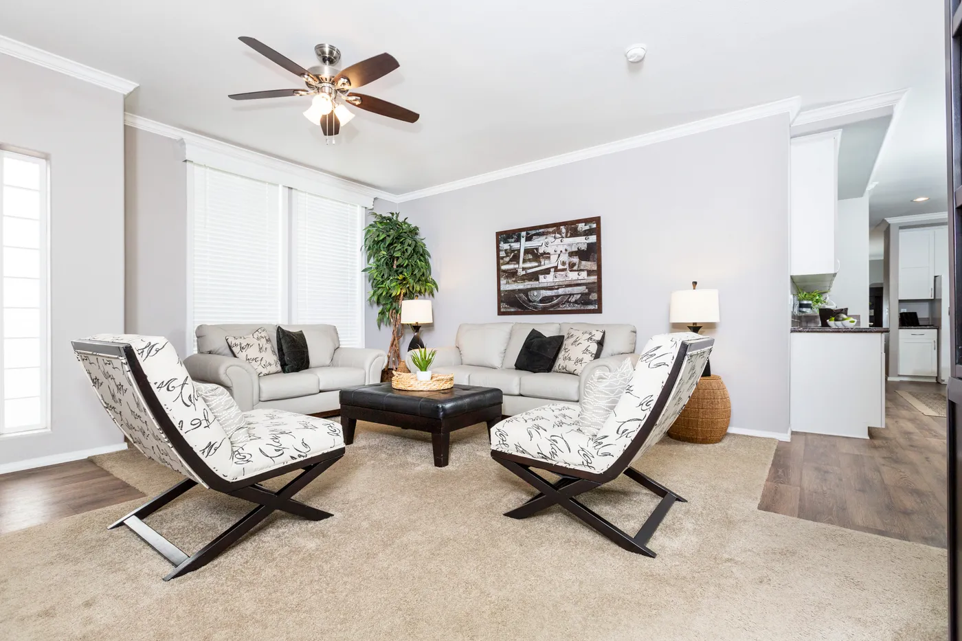 The ENCHANTMENT 3070A Living Room. This Manufactured Mobile Home features 3 bedrooms and 2 baths.