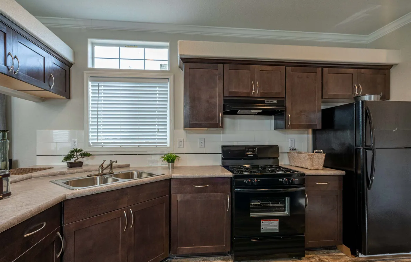 The K1640A Kitchen. This Manufactured Mobile Home features 1 bedroom and 1 bath.