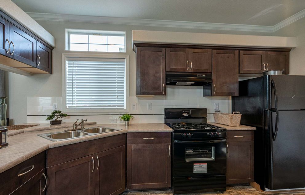 The K1640A Kitchen. This Manufactured Mobile Home features 1 bedroom and 1 bath.