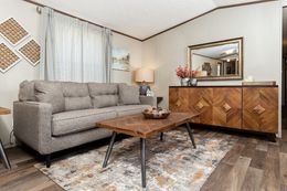 The GRAND Living Room. This Manufactured Mobile Home features 4 bedrooms and 2 baths.