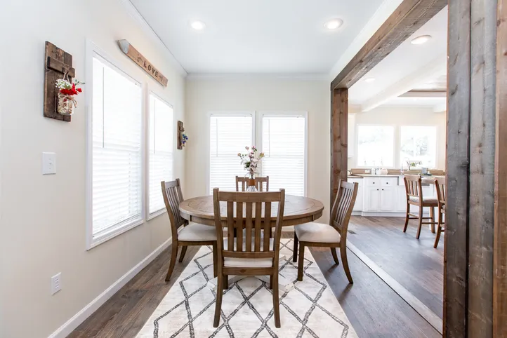 The SOUTHERN CHARM Dining Room. This Manufactured Mobile Home features 3 bedrooms and 2 baths.