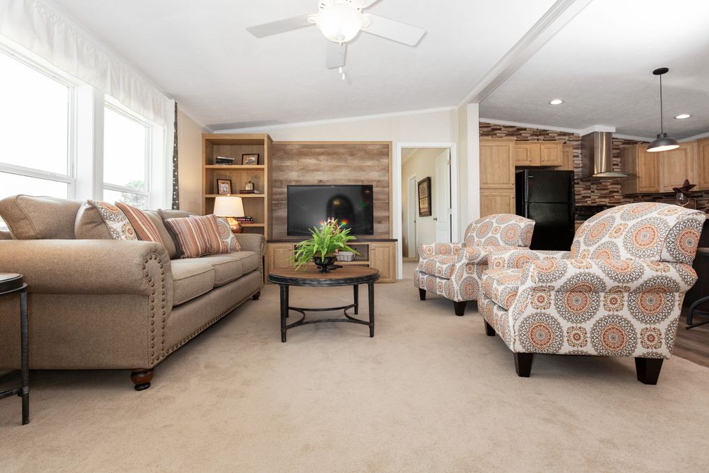 The SHEER ELM Living Room. This Manufactured Mobile Home features 3 bedrooms and 2 baths.