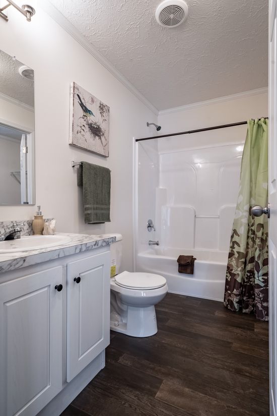 The 4620 "957 PARK AVENUE" 6428 Guest Bathroom. This Manufactured Mobile Home features 3 bedrooms and 2 baths.