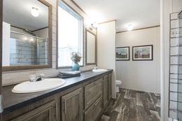 The THE SOUTHERN FARMHOUSE Primary Bathroom. This Manufactured Mobile Home features 3 bedrooms and 2 baths.