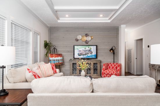 The 1439 CAROLINA "MAGNOLIA" Living Room. This Manufactured Mobile Home features 3 bedrooms and 2 baths.