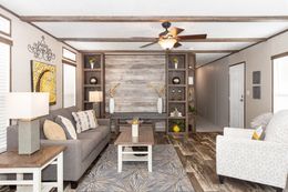 The THE ANNIVERSARY 76 Living Room. This Manufactured Mobile Home features 3 bedrooms and 2 baths.