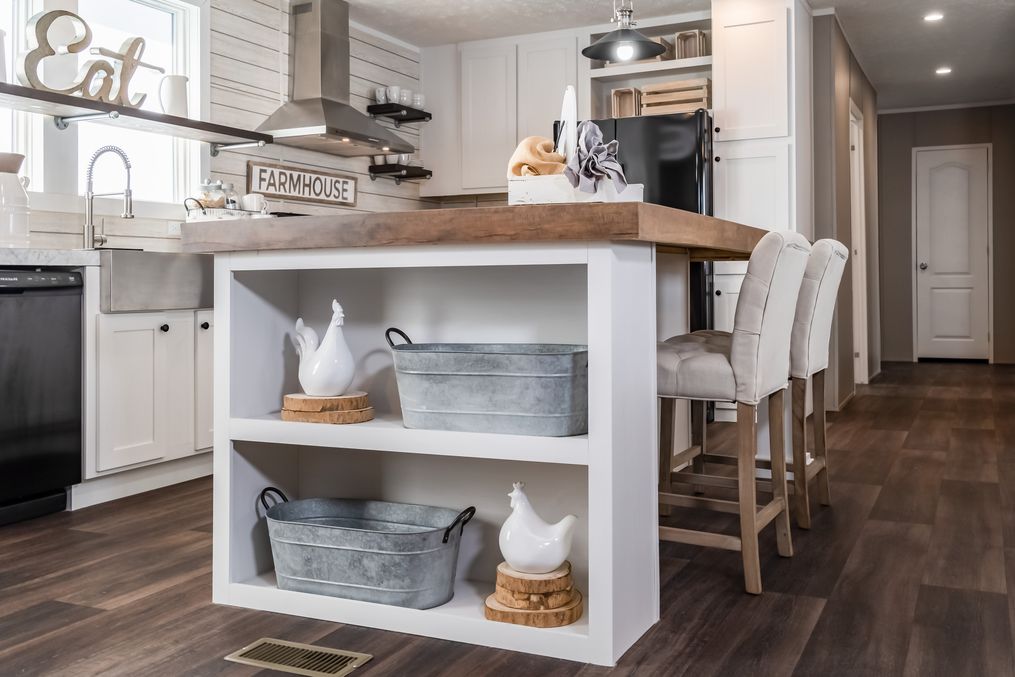 The THE RESERVE 60 Kitchen. This Manufactured Mobile Home features 3 bedrooms and 2 baths.