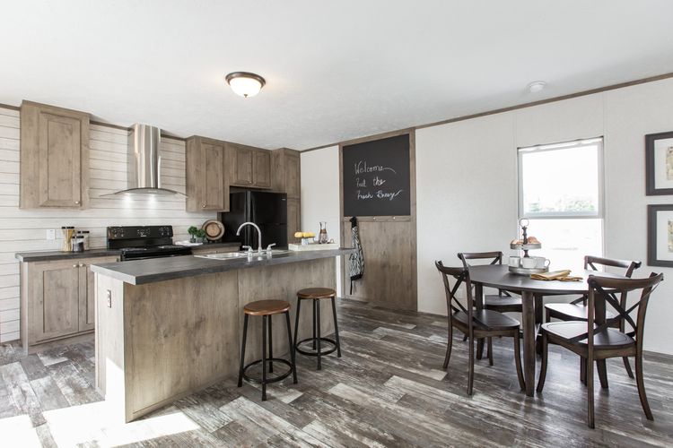 The THE BREEZE Kitchen. This Manufactured Mobile Home features 3 bedrooms and 2 baths.