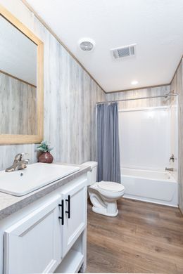 The EVEREST Guest Bathroom. This Manufactured Mobile Home features 4 bedrooms and 2 baths.