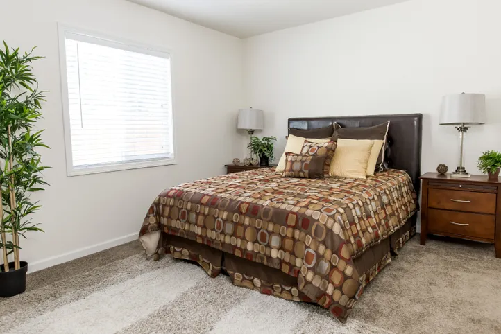 The FAIRPOINT 24463A Primary Bedroom. This Manufactured Mobile Home features 3 bedrooms and 2 baths.