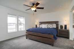 The CERISE Primary Bedroom. This Manufactured Mobile Home features 4 bedrooms and 2 baths.