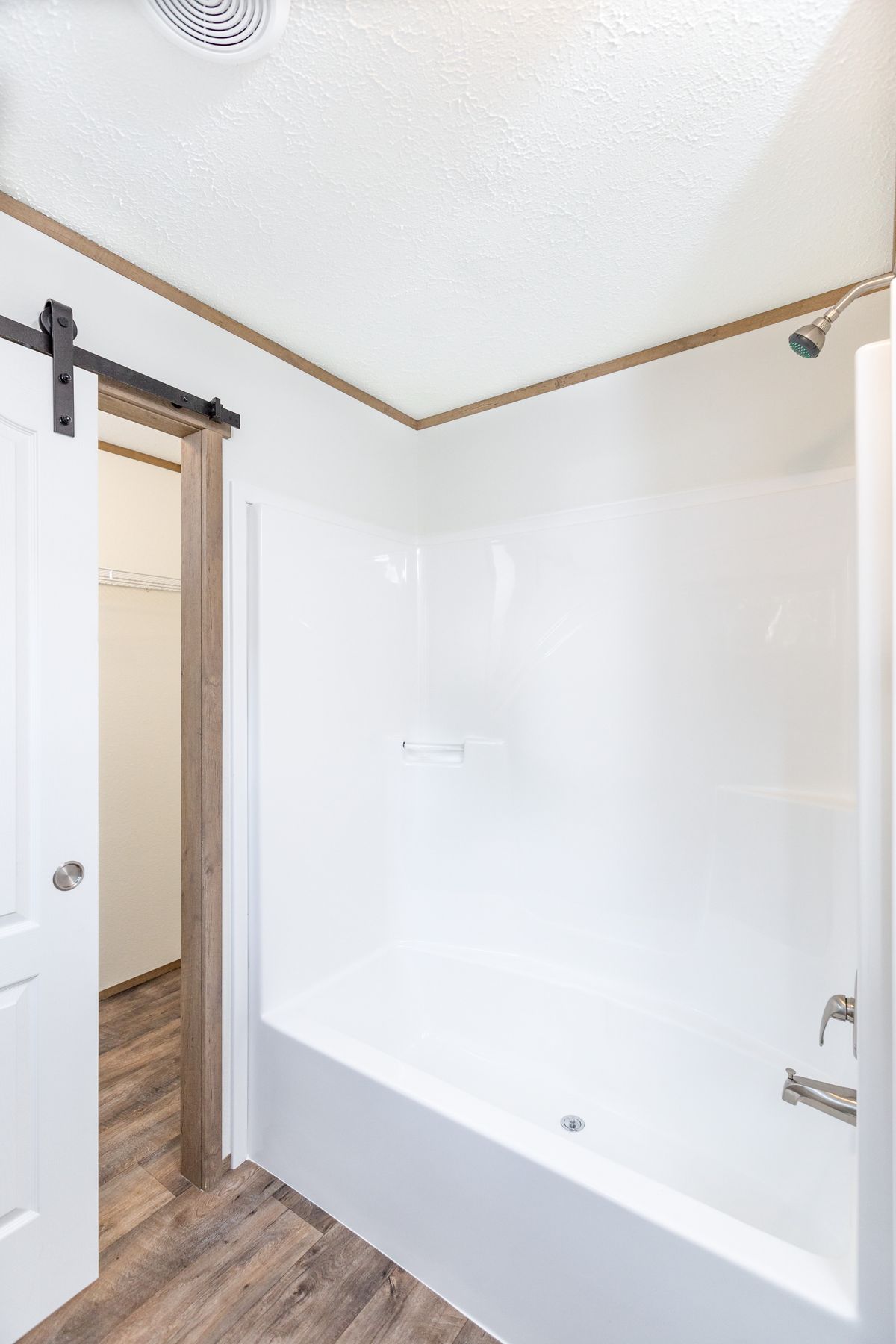 The LIFESTYLE 211 Primary Bathroom. This Manufactured Mobile Home features 3 bedrooms and 2 baths.