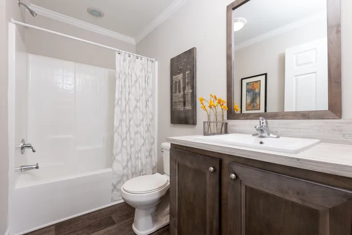 The THE FREEDOM SOHO Guest Bathroom. This Manufactured Mobile Home features 3 bedrooms and 2 baths.