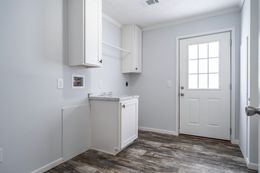 The THE LEAHY Utility Room. This Manufactured Mobile Home features 4 bedrooms and 2 baths.