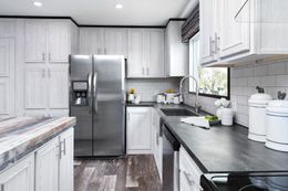 The SIG28663A Kitchen. This Manufactured Mobile Home features 3 bedrooms and 2 baths.