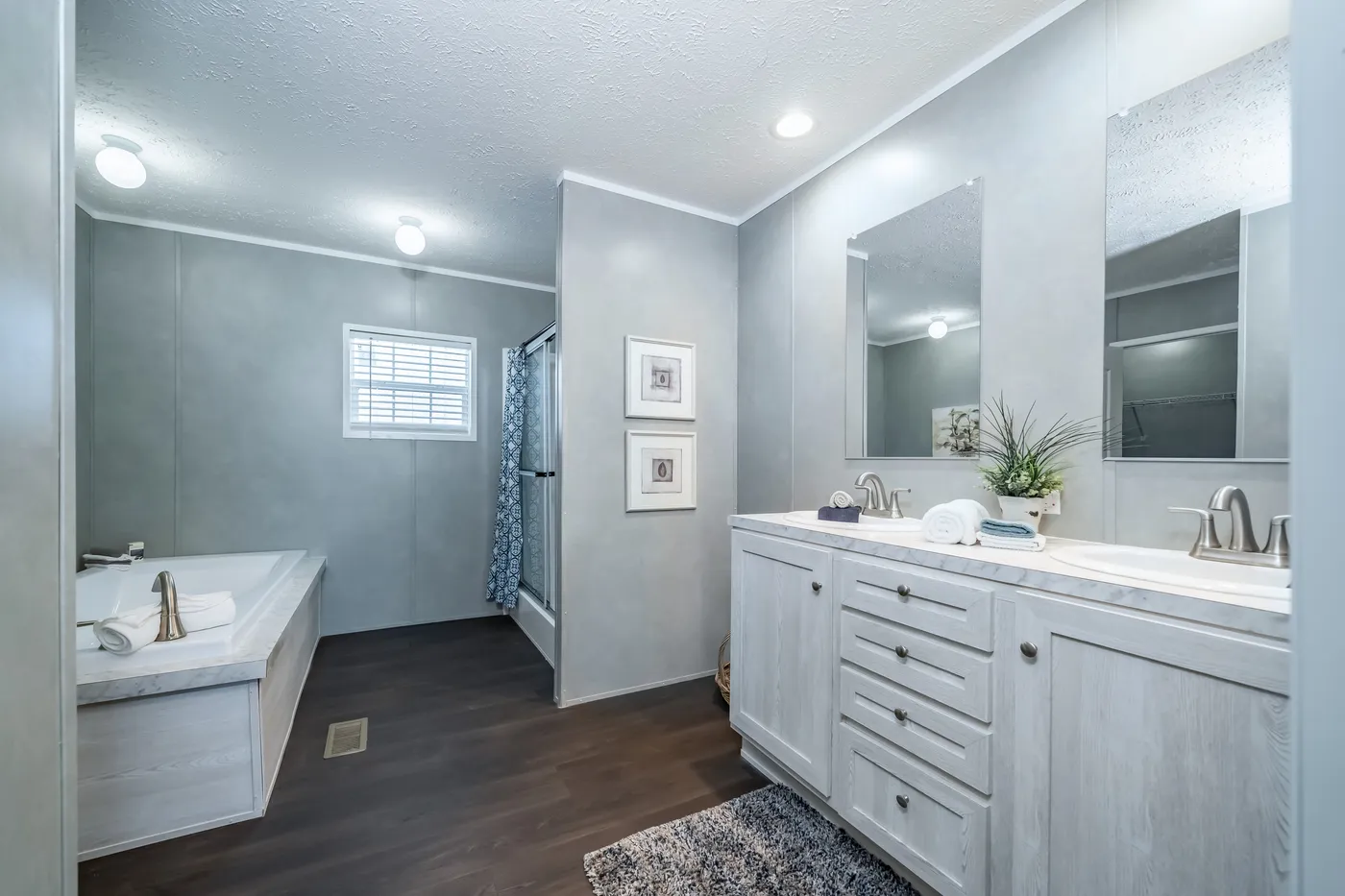 The ULTRA BREEZE 52 Primary Bathroom. This Manufactured Mobile Home features 3 bedrooms and 2 baths.