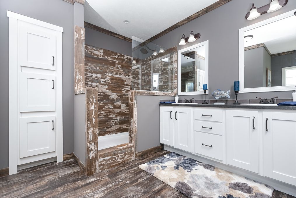 The THE MCGARRITY Master Bathroom. This Manufactured Mobile Home features 4 bedrooms and 2 baths.