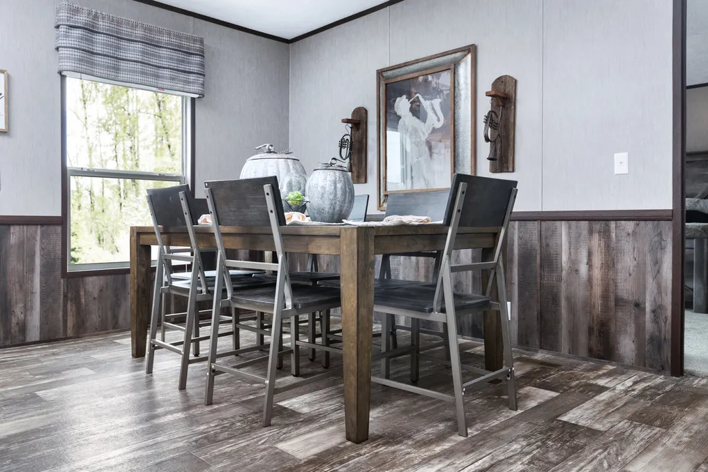 The SIG28663A Dining Area. This Manufactured Mobile Home features 3 bedrooms and 2 baths.