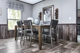 The SIG28663A Dining Area. This Manufactured Mobile Home features 3 bedrooms and 2 baths.