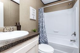 The CHALLENGER 16763B Guest Bathroom. This Manufactured Mobile Home features 3 bedrooms and 2 baths.