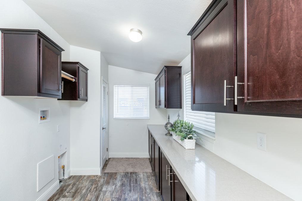 The GLE661K Utility Room. This Manufactured Mobile Home features 3 bedrooms and 2 baths.