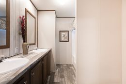 The THE LODGE Primary Bathroom. This Manufactured Mobile Home features 2 bedrooms and 2 baths.