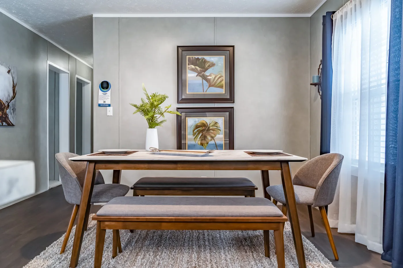 The ULTRA BREEZE 52 Dining Area. This Manufactured Mobile Home features 3 bedrooms and 2 baths.