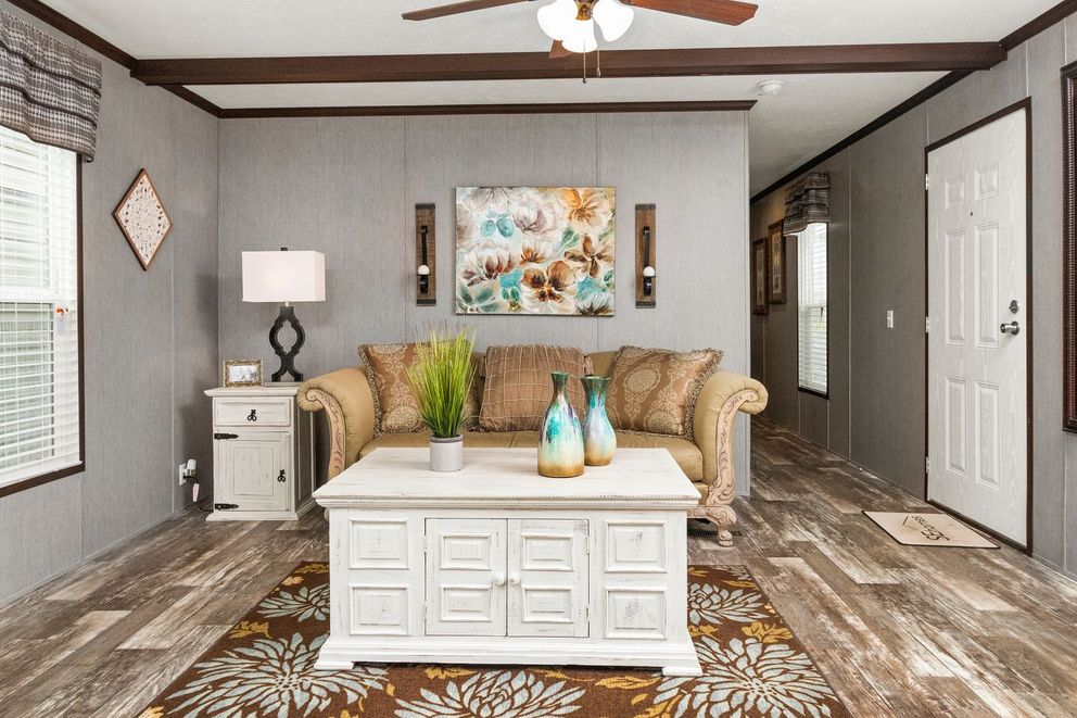 The THE SEASIDE Den. This Manufactured Mobile Home features 3 bedrooms and 2 baths.