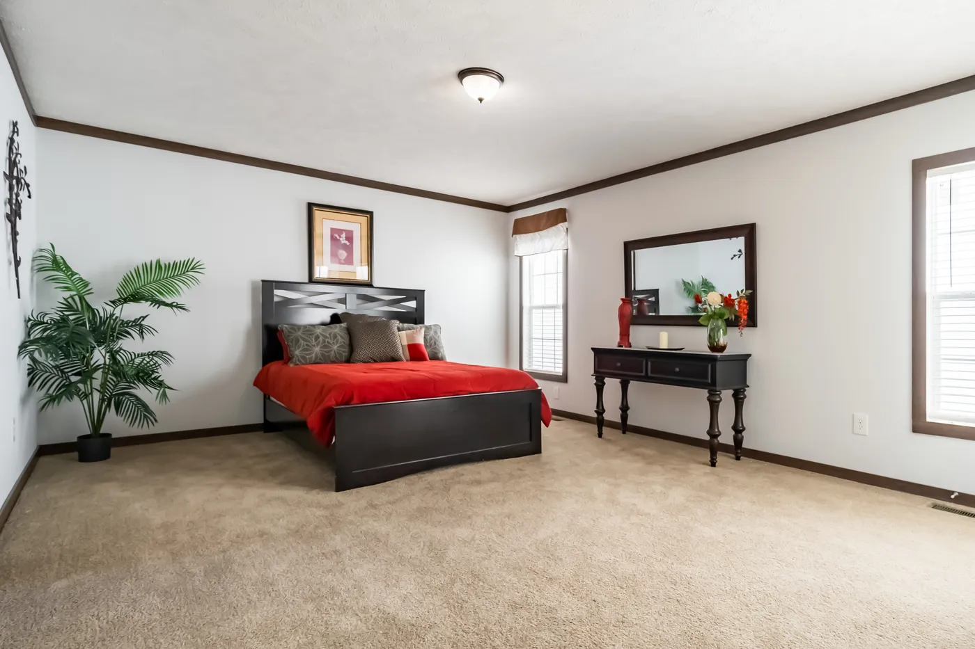 The THE TURNER Primary Bedroom. This Manufactured Mobile Home features 3 bedrooms and 2 baths.