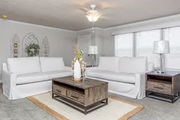 The REMINGTON Living Room. This Manufactured Mobile Home features 3 bedrooms and 2 baths.
