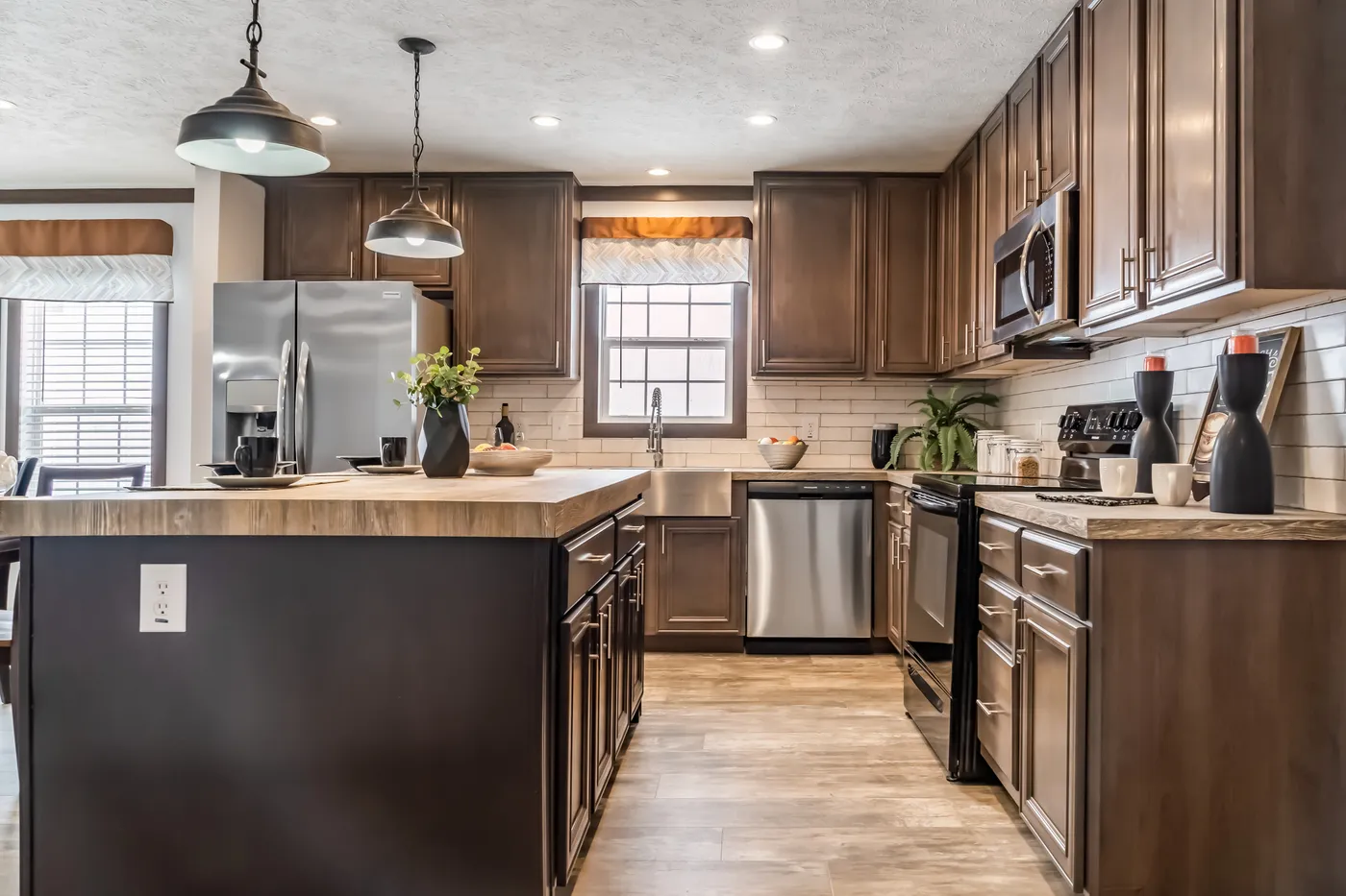 The THE TURNER Kitchen. This Manufactured Mobile Home features 3 bedrooms and 2 baths.