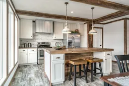 The THE AVALYN Kitchen. This Manufactured Mobile Home features 3 bedrooms and 2 baths.