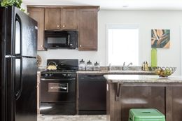 The FAIRPOINT 24463A Kitchen. This Manufactured Mobile Home features 3 bedrooms and 2 baths.