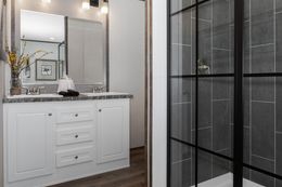 The PLATINUM ANNIVERSARY Primary Bathroom. This Manufactured Mobile Home features 3 bedrooms and 2 baths.