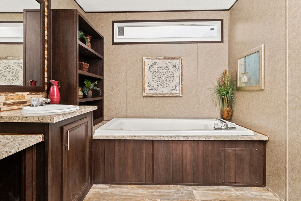 The THE PARKSIDE Master Bathroom. This Manufactured Mobile Home features 3 bedrooms and 2 baths.