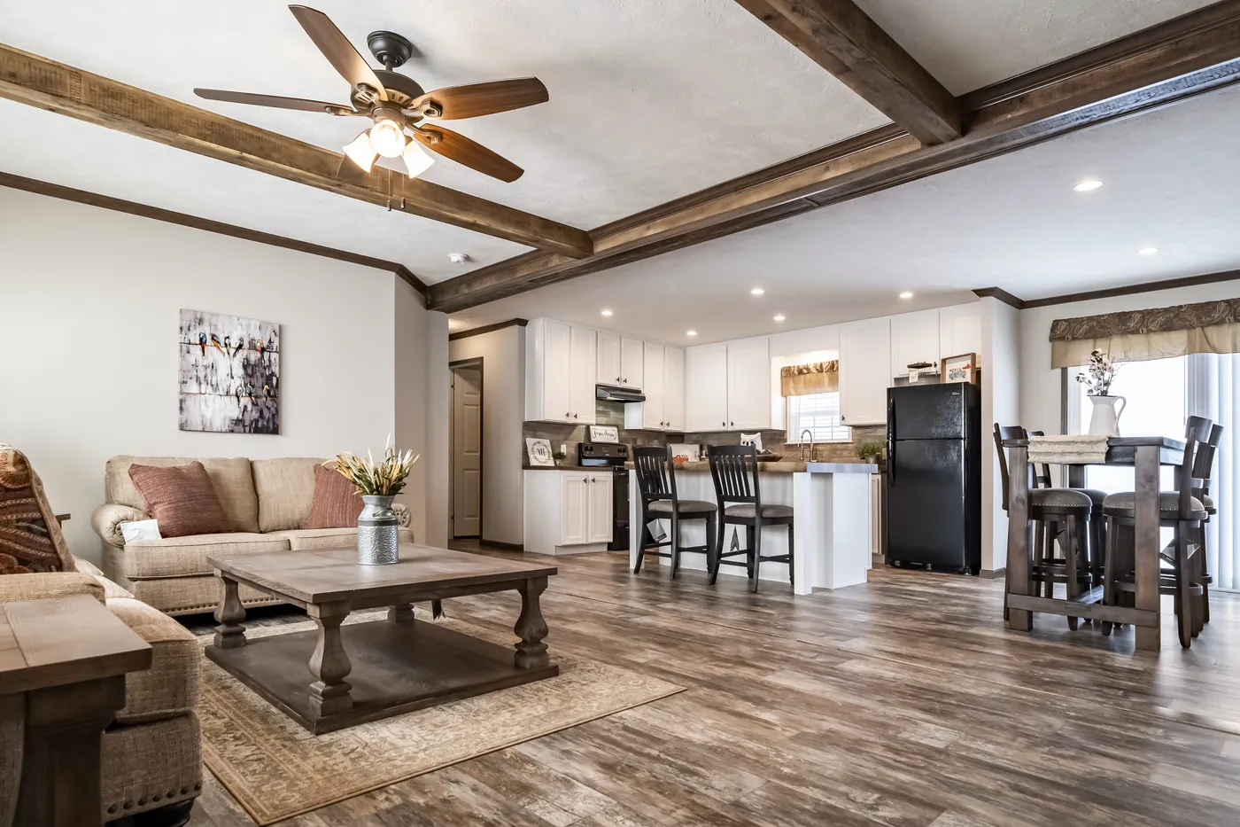 The THE STARK Living Room. This Manufactured Mobile Home features 3 bedrooms and 2 baths.