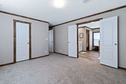 The THE MAVERICK Master Bedroom. This Manufactured Mobile Home features 4 bedrooms and 2 baths.