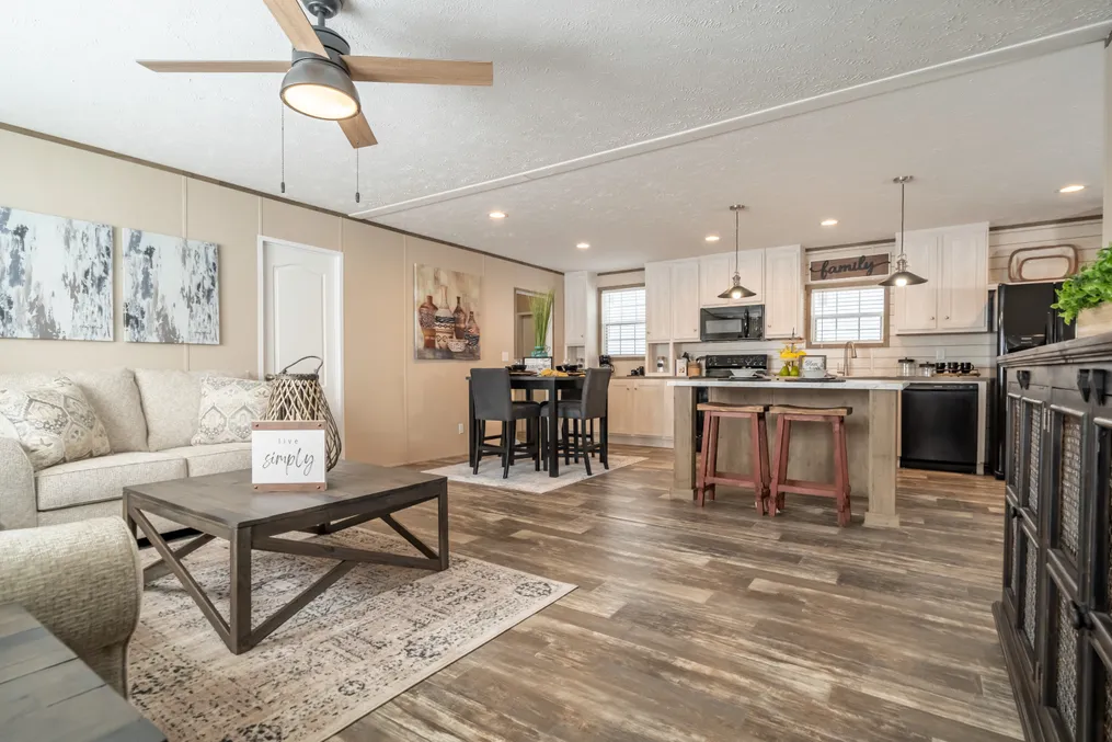 The ULTRA PRO 56B Living Room. This Manufactured Mobile Home features 3 bedrooms and 2 baths.