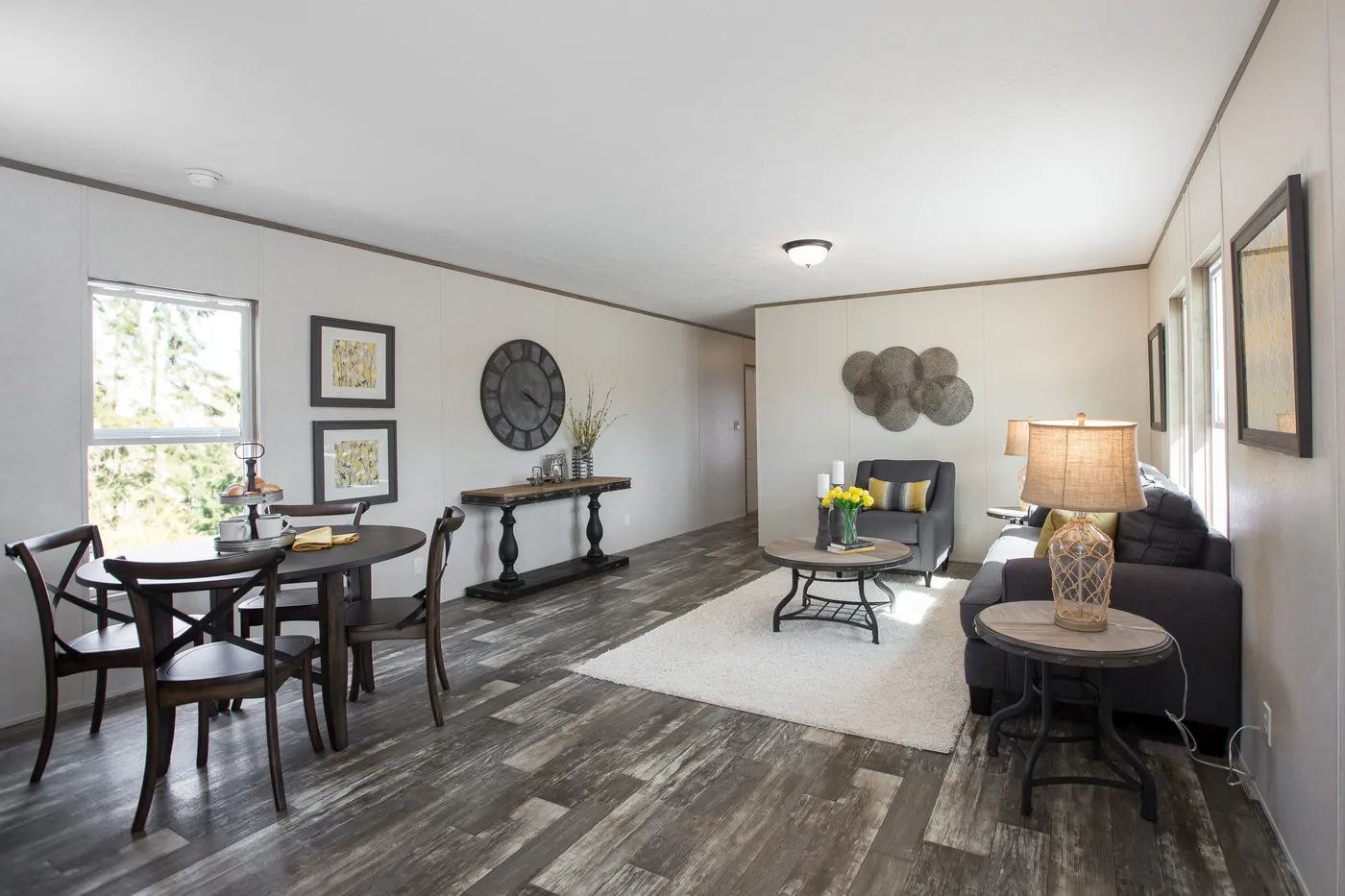 The THE BREEZE Living Room. This Manufactured Mobile Home features 3 bedrooms and 2 baths.