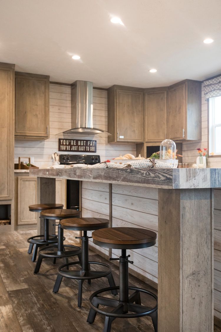 The THE CREEKWOOD Kitchen. This Manufactured Mobile Home features 4 bedrooms and 2 baths.