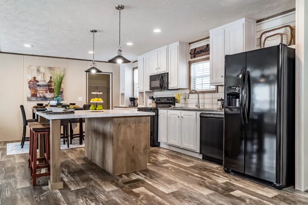 The ULTRA PRO 56B Kitchen. This Manufactured Mobile Home features 3 bedrooms and 2 baths.