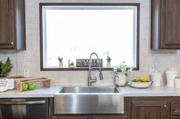 The THE HAMPTON BAY Kitchen. This Manufactured Mobile Home features 3 bedrooms and 2 baths.