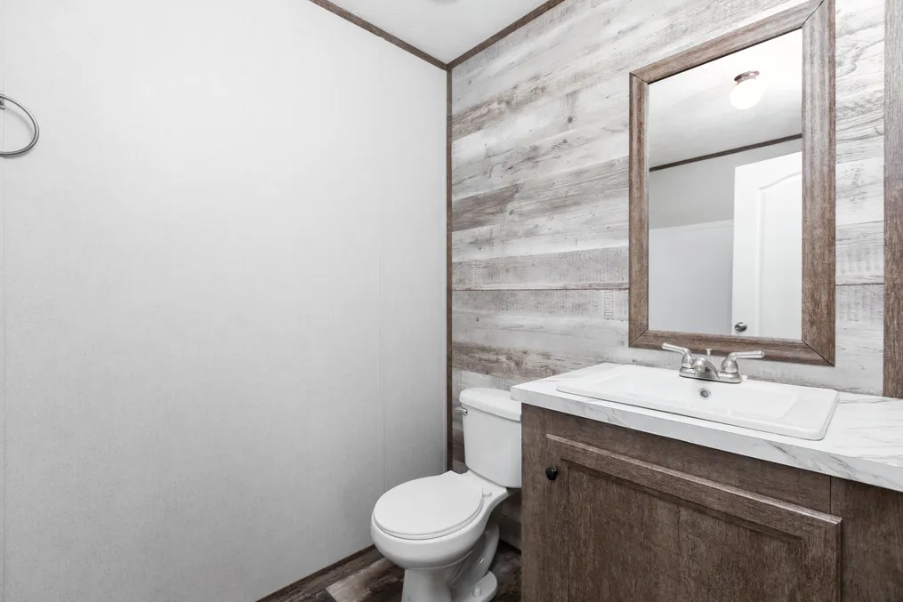 The THE SOCIAL 76 Guest Bathroom. This Manufactured Mobile Home features 3 bedrooms and 2 baths.