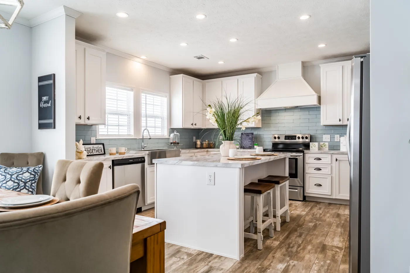 The THE INGRAM Kitchen. This Manufactured Mobile Home features 3 bedrooms and 2 baths.