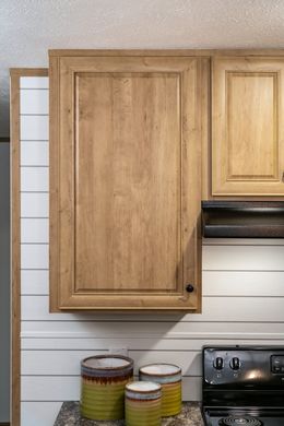 The BLAZER EXTREME 1666 F Kitchen. This Manufactured Mobile Home features 3 bedrooms and 2 baths.