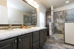 The 2023 COLUMBIA RIVER Primary Bathroom. This Manufactured Mobile Home features 3 bedrooms and 2 baths.