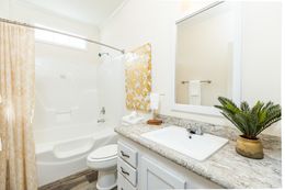The 1714 HERITAGE Guest Bathroom. This Manufactured Mobile Home features 3 bedrooms and 2 baths.
