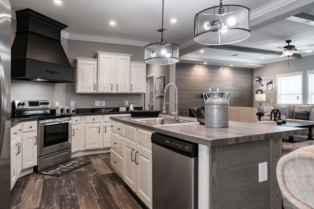 The THE TEAGAN Kitchen. This Manufactured Mobile Home features 4 bedrooms and 3 baths.