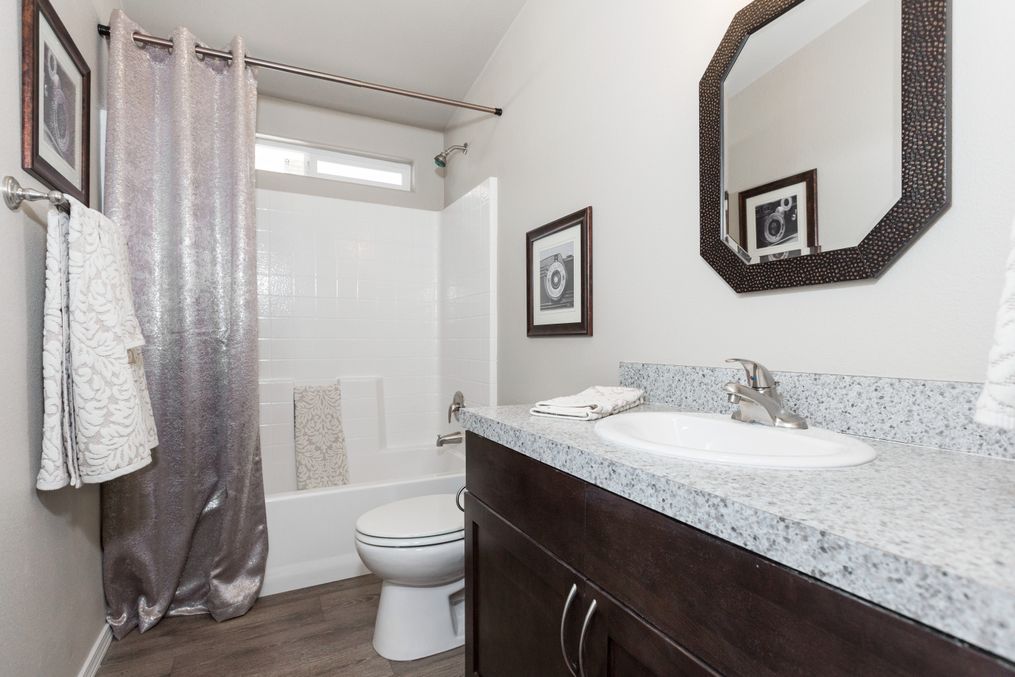 The K2744A Guest Bathroom. This Manufactured Mobile Home features 3 bedrooms and 2 baths.